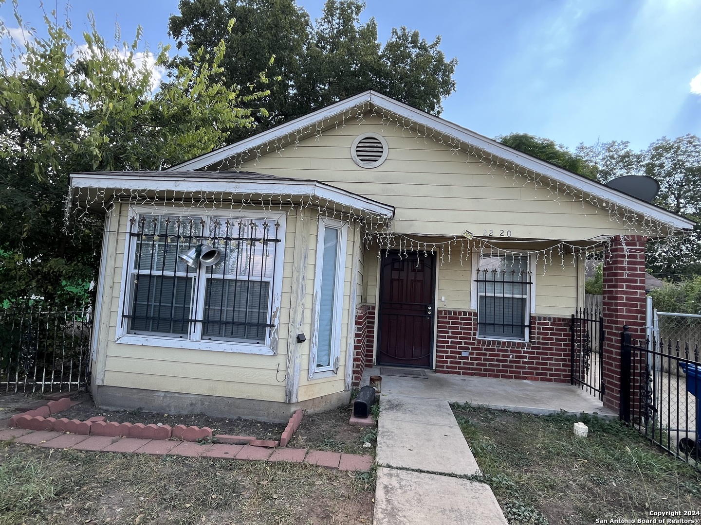 a front view of a house with a garage