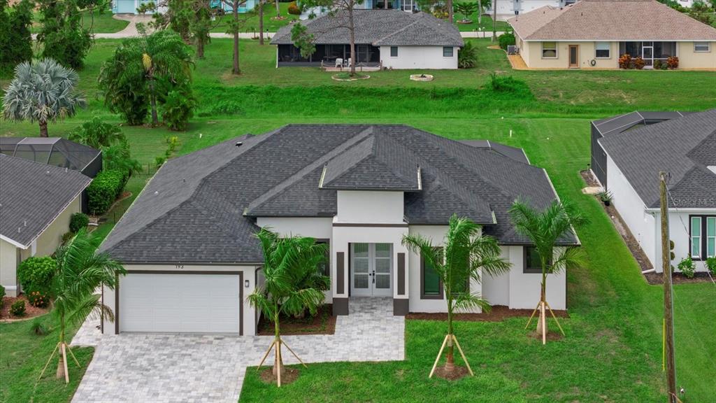 front view of a house with a yard