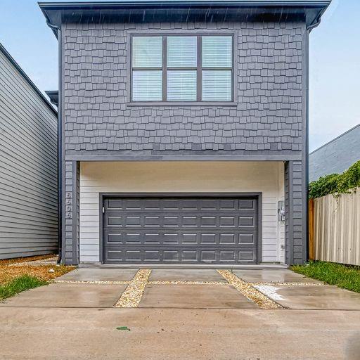 a front view of a house having yard