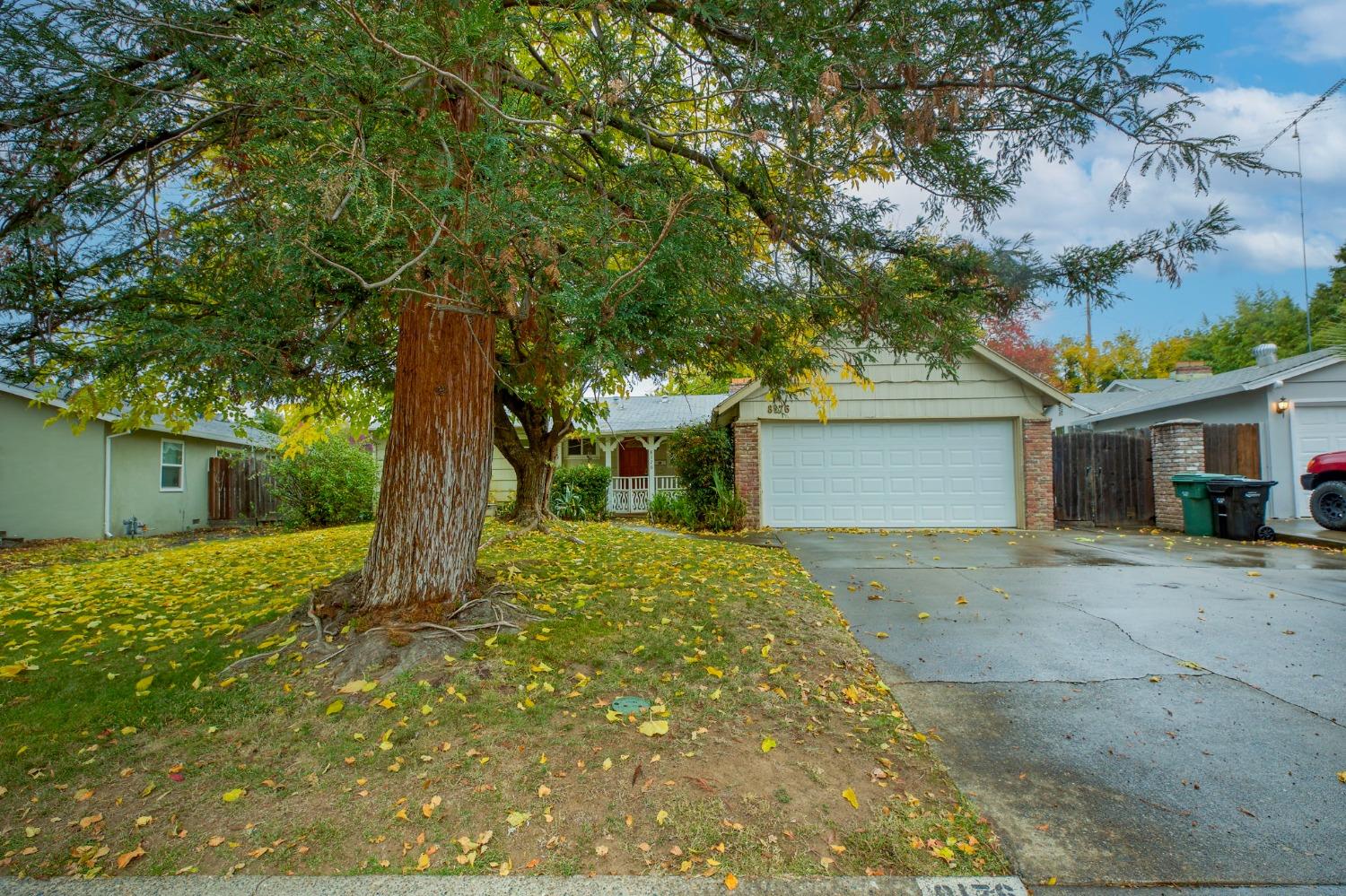 front view of a house with a trees