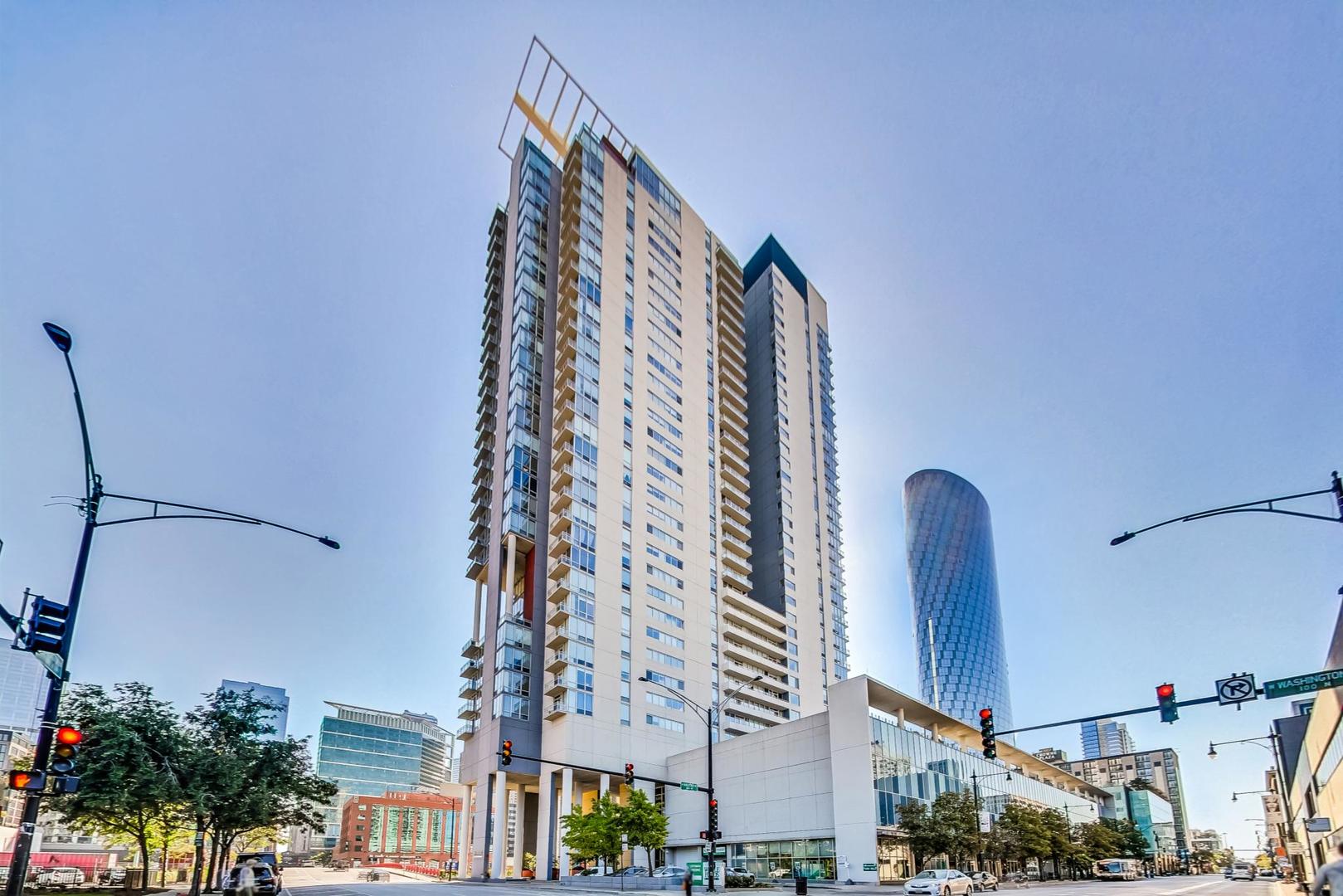 a view of a city with tall buildings