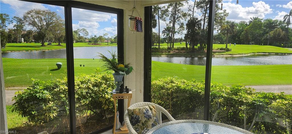 a view of a backyard with garden and patio