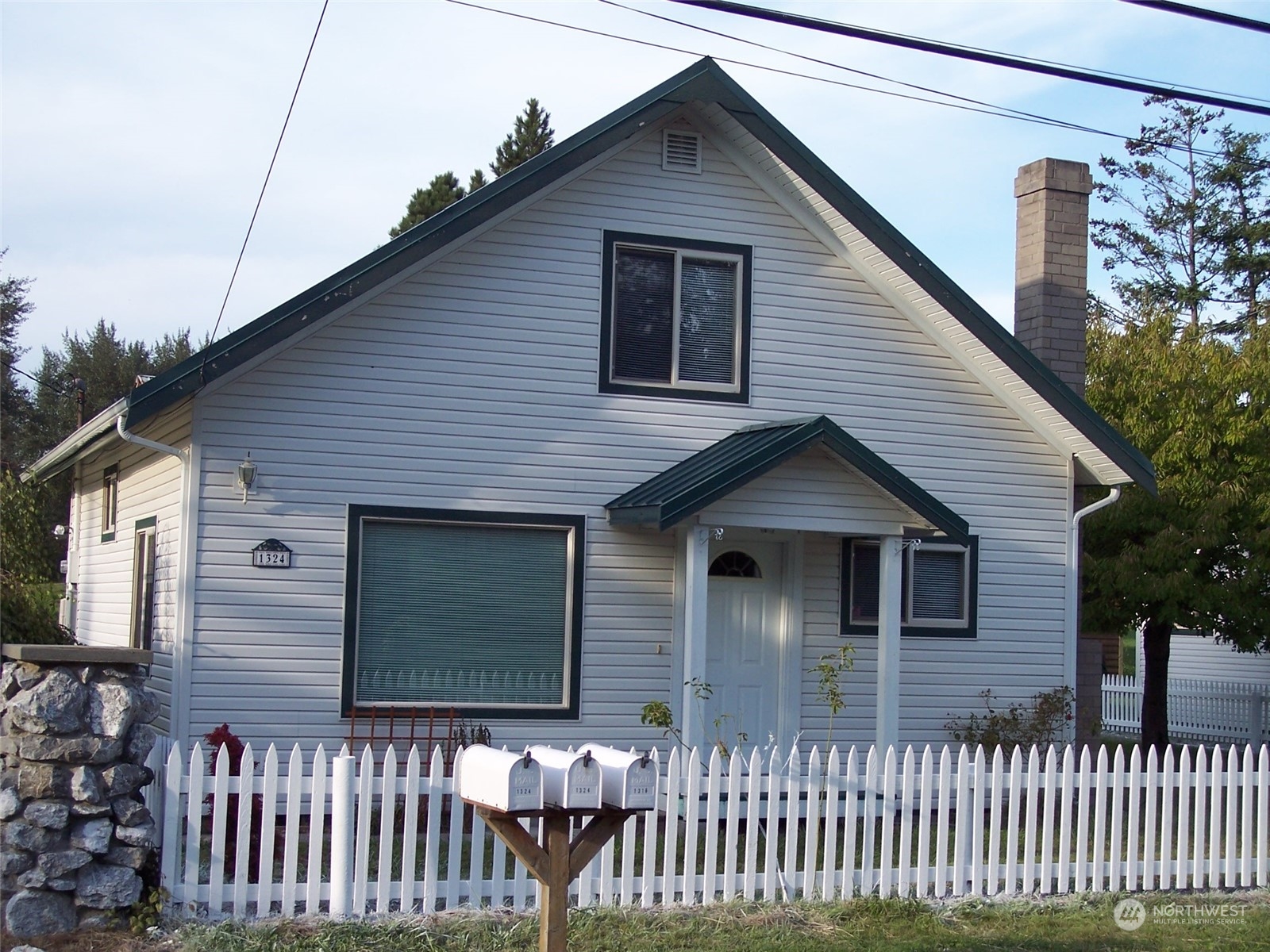 a front view of a house with a porch