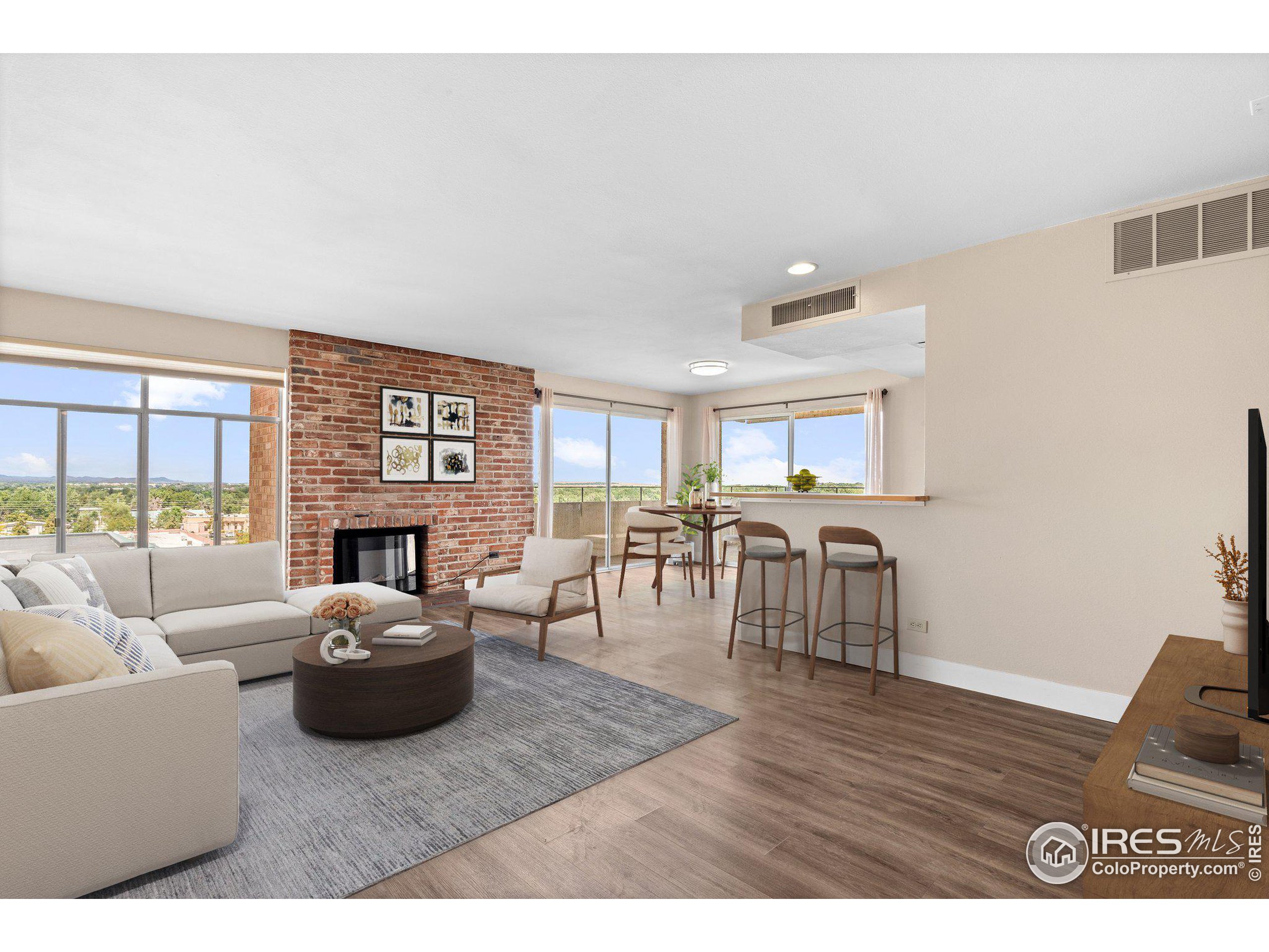 a living room with furniture and a table