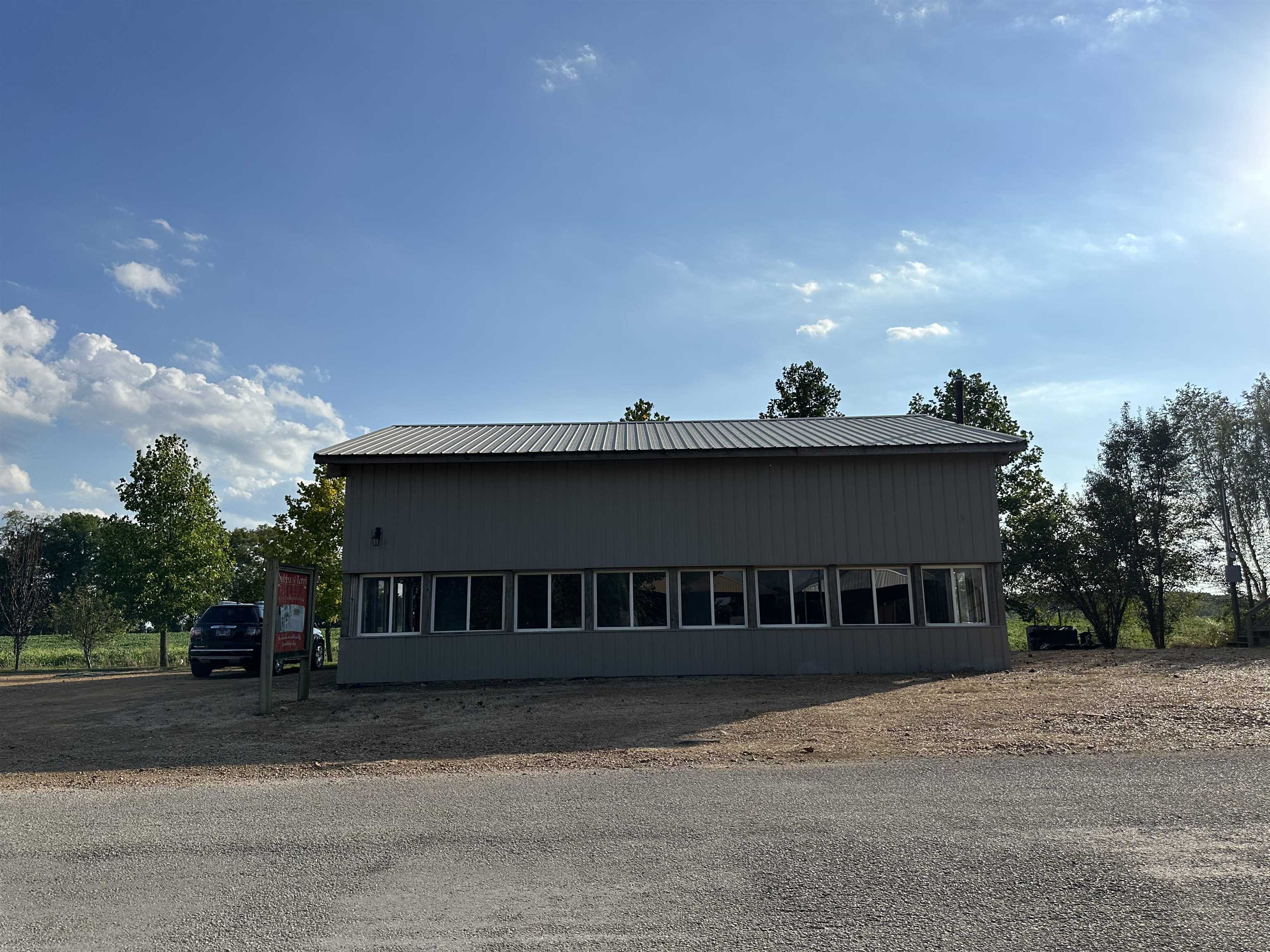 a view of house with outdoor space and street view