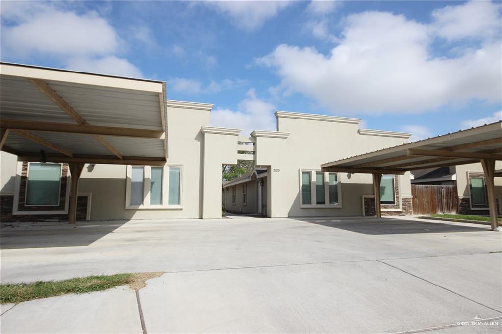 a view of a building with a garage