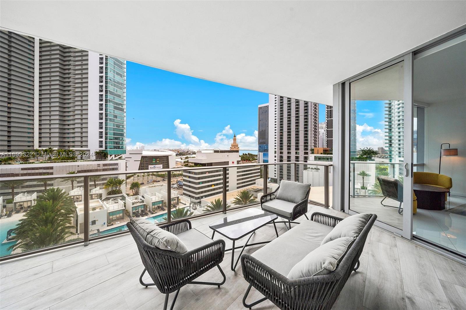 a view of a livingroom with furniture and outdoor view