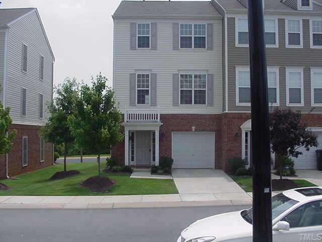 a house view with a garden space