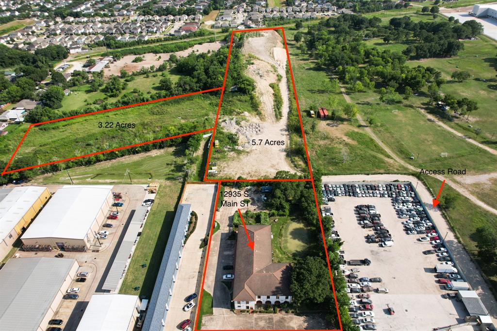 Aerial of land and access road from Hwy 90 Alt. Property is indicated by "5.7 acres" marker