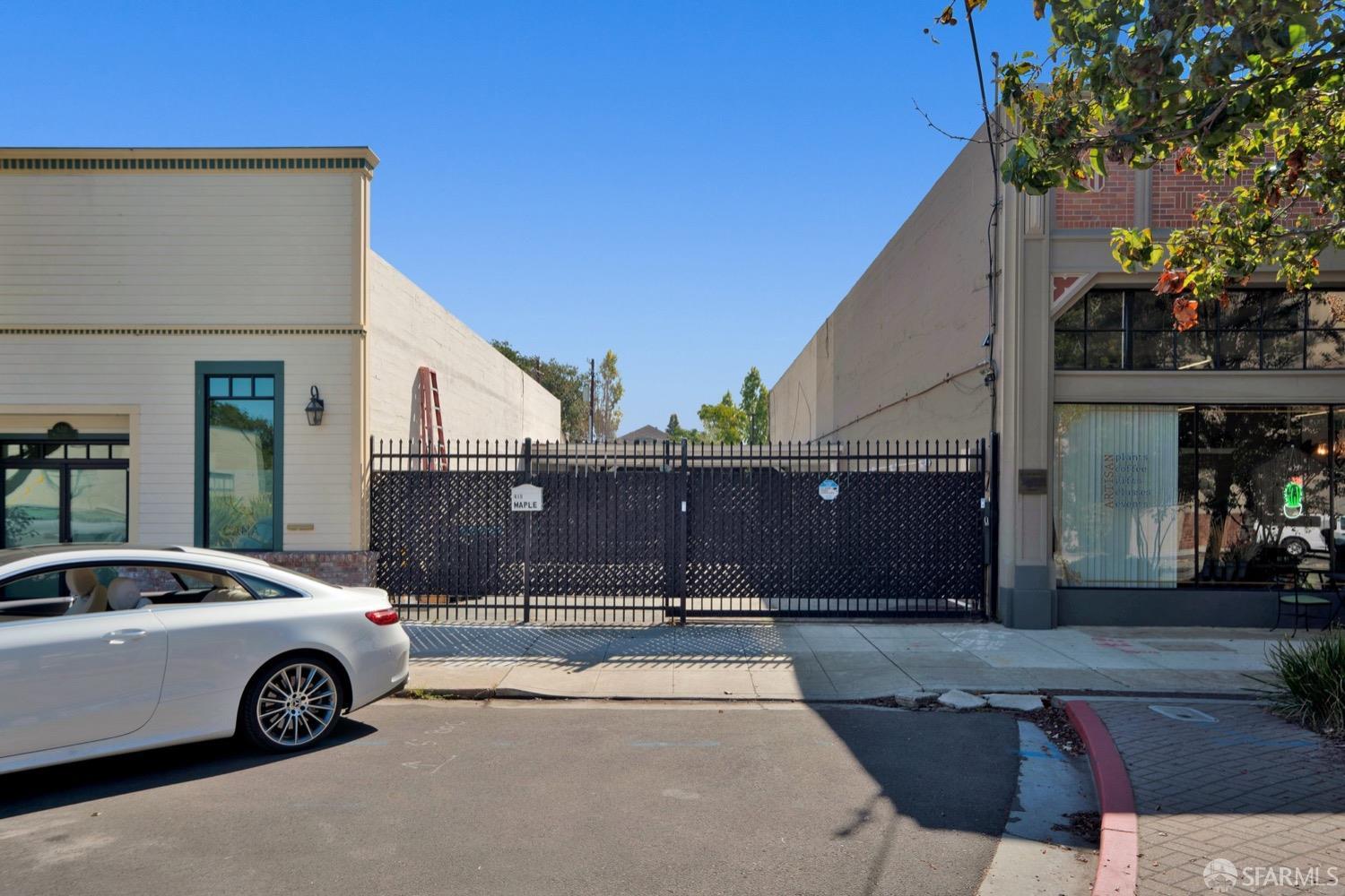 a view of a car parked in front of a house