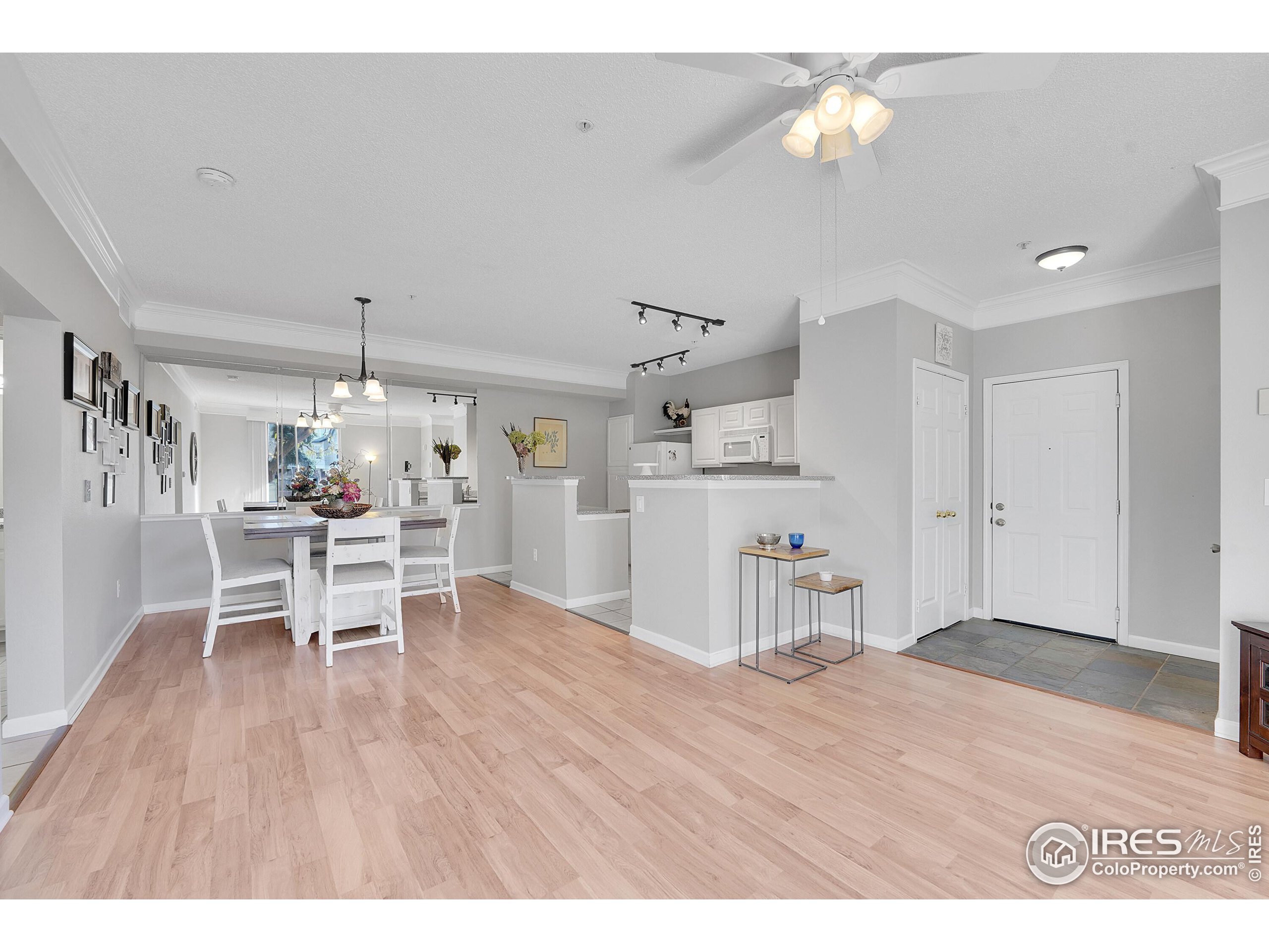 a room with furniture and wooden floor