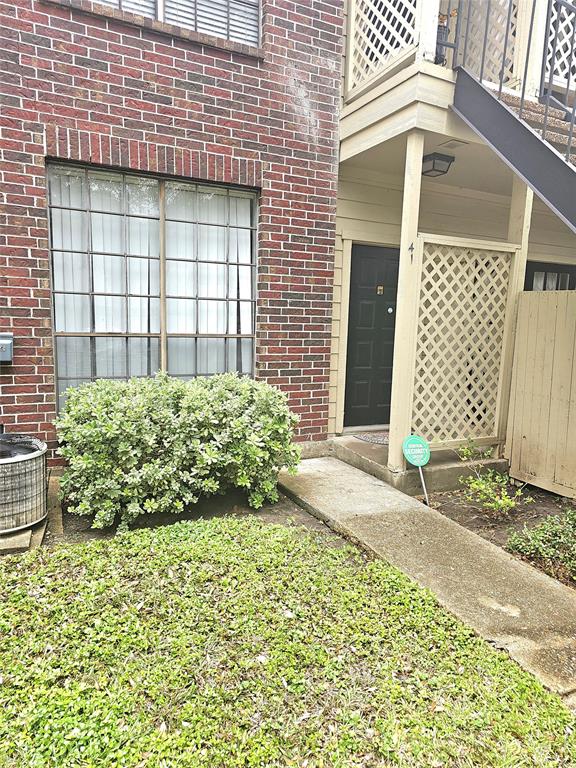 a view of a backyard of a house