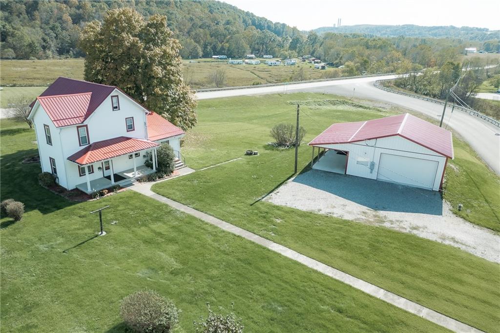 a view of a house with a yard