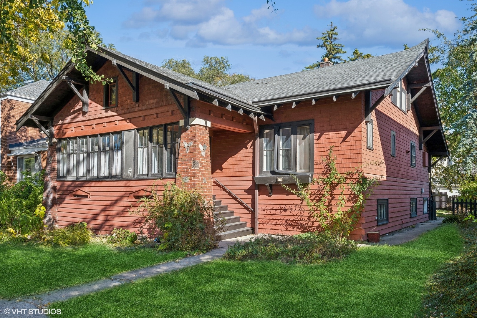 front view of a house with a yard