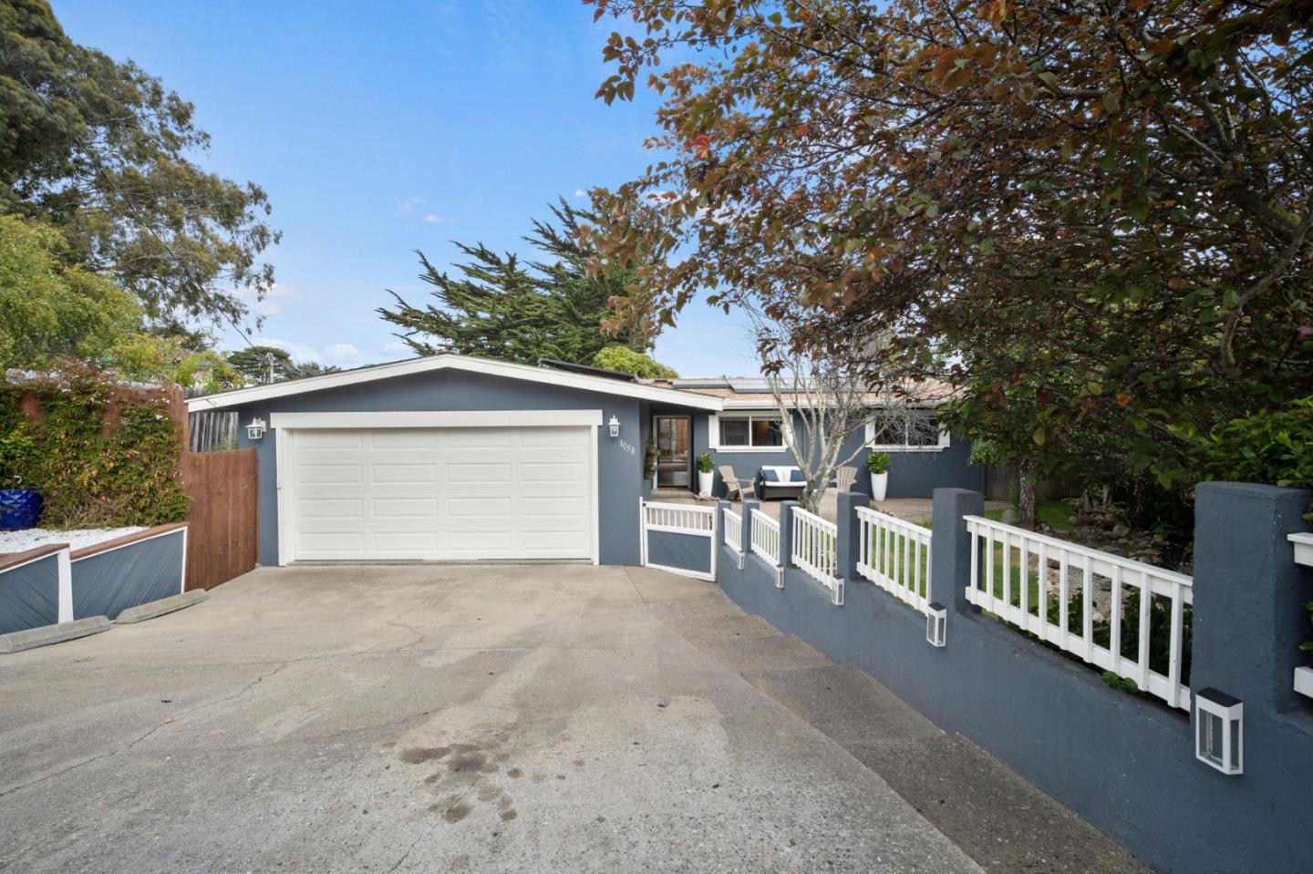 a view of backyard and deck