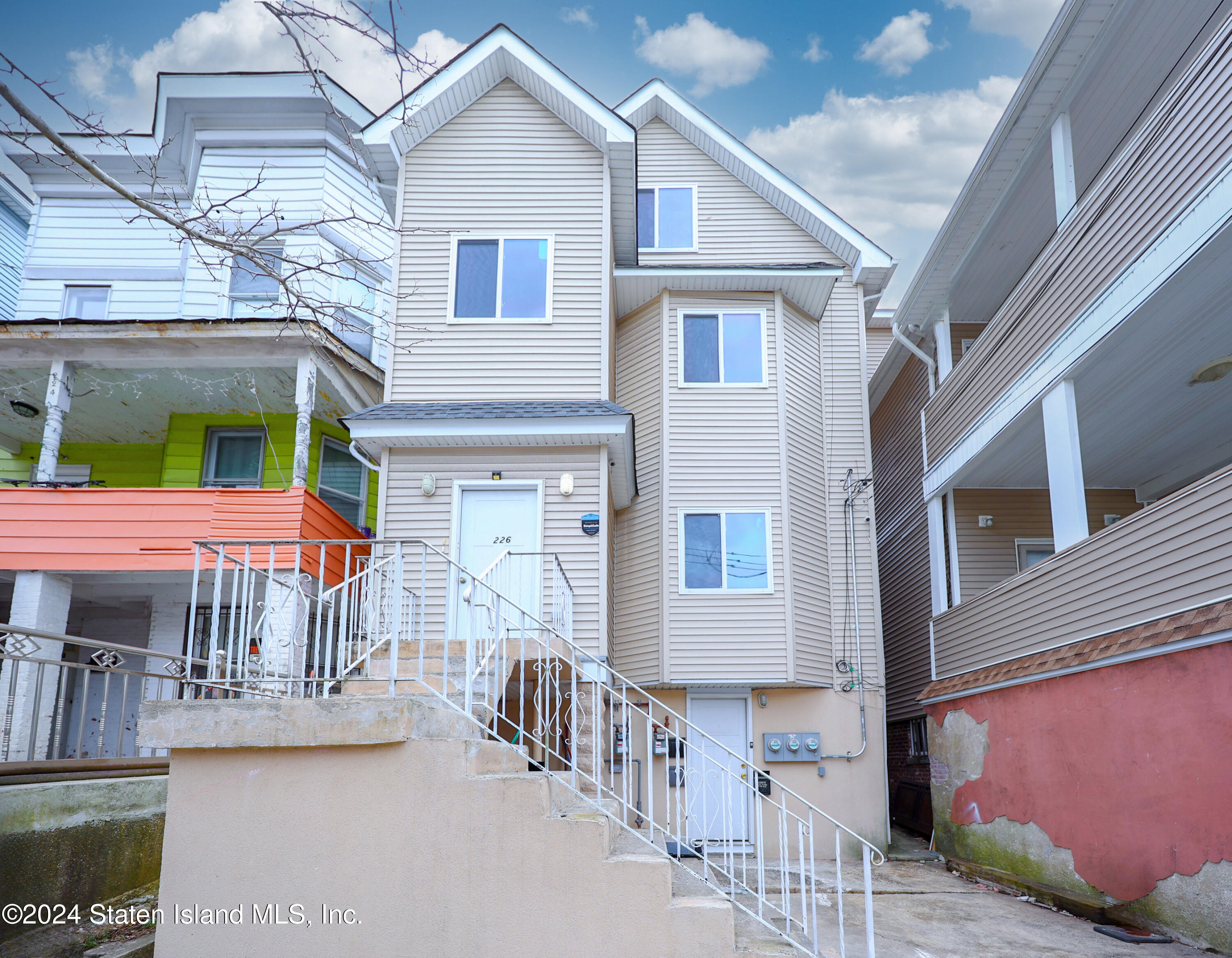 a view of a house with a patio