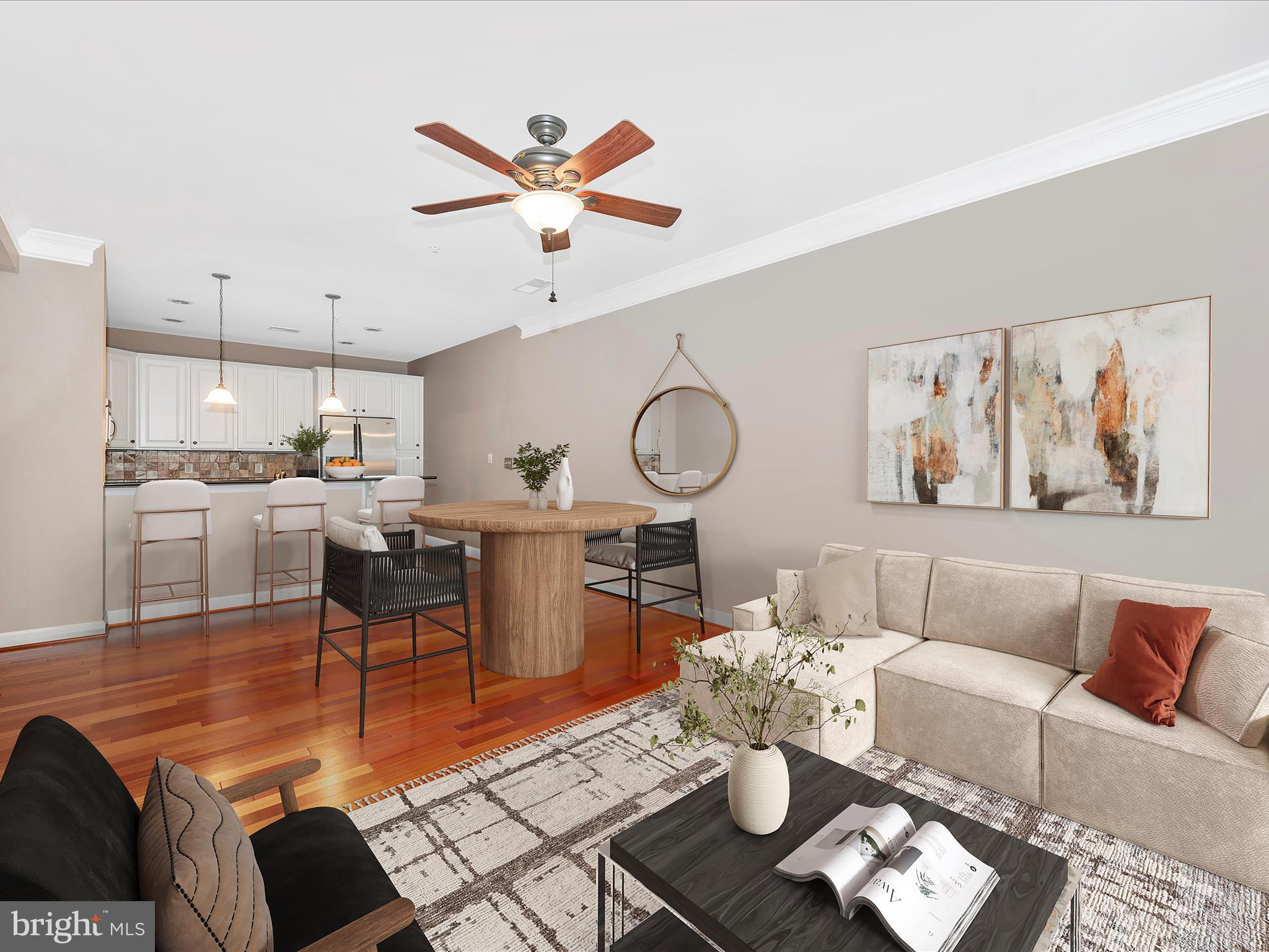 a living room with furniture kitchen view and a window