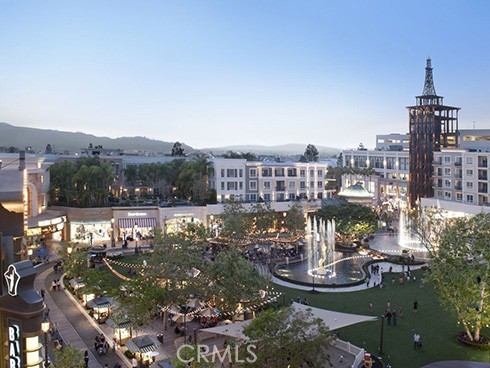 a view of a city with tall buildings in the background