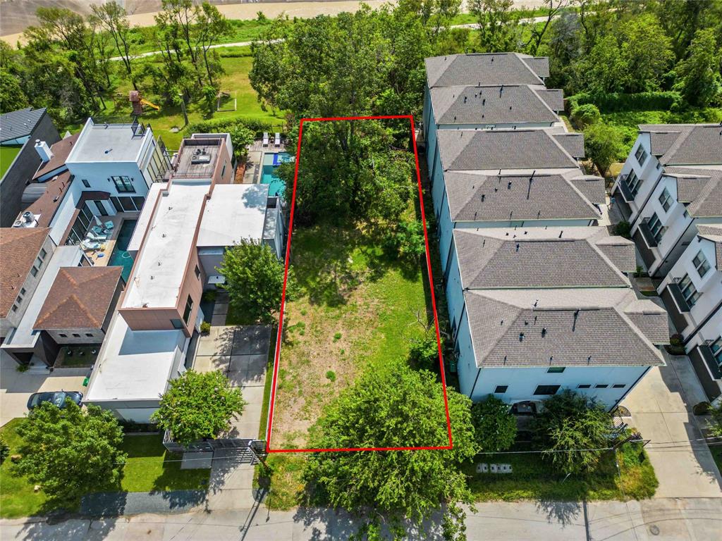 an aerial view of a house with a garden