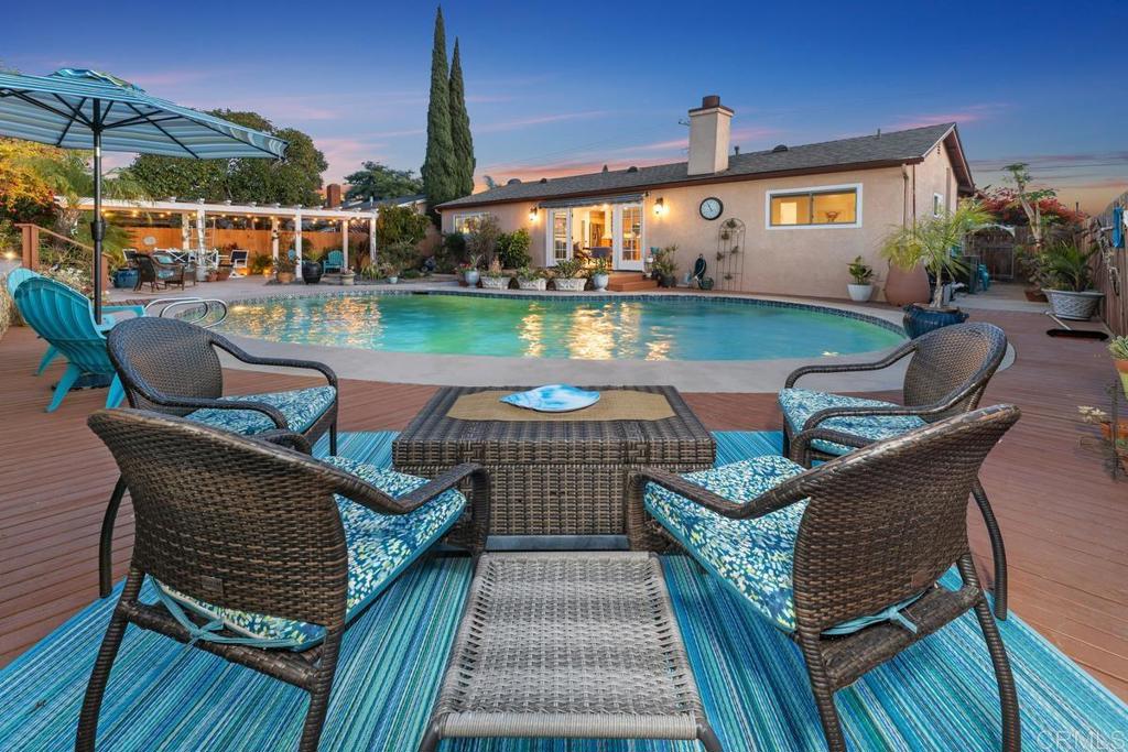 a roof deck view with a seating space