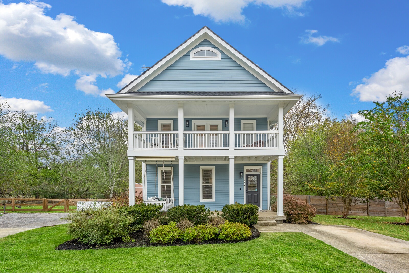 Welcome Home! Double front porches make this special home even more charming!