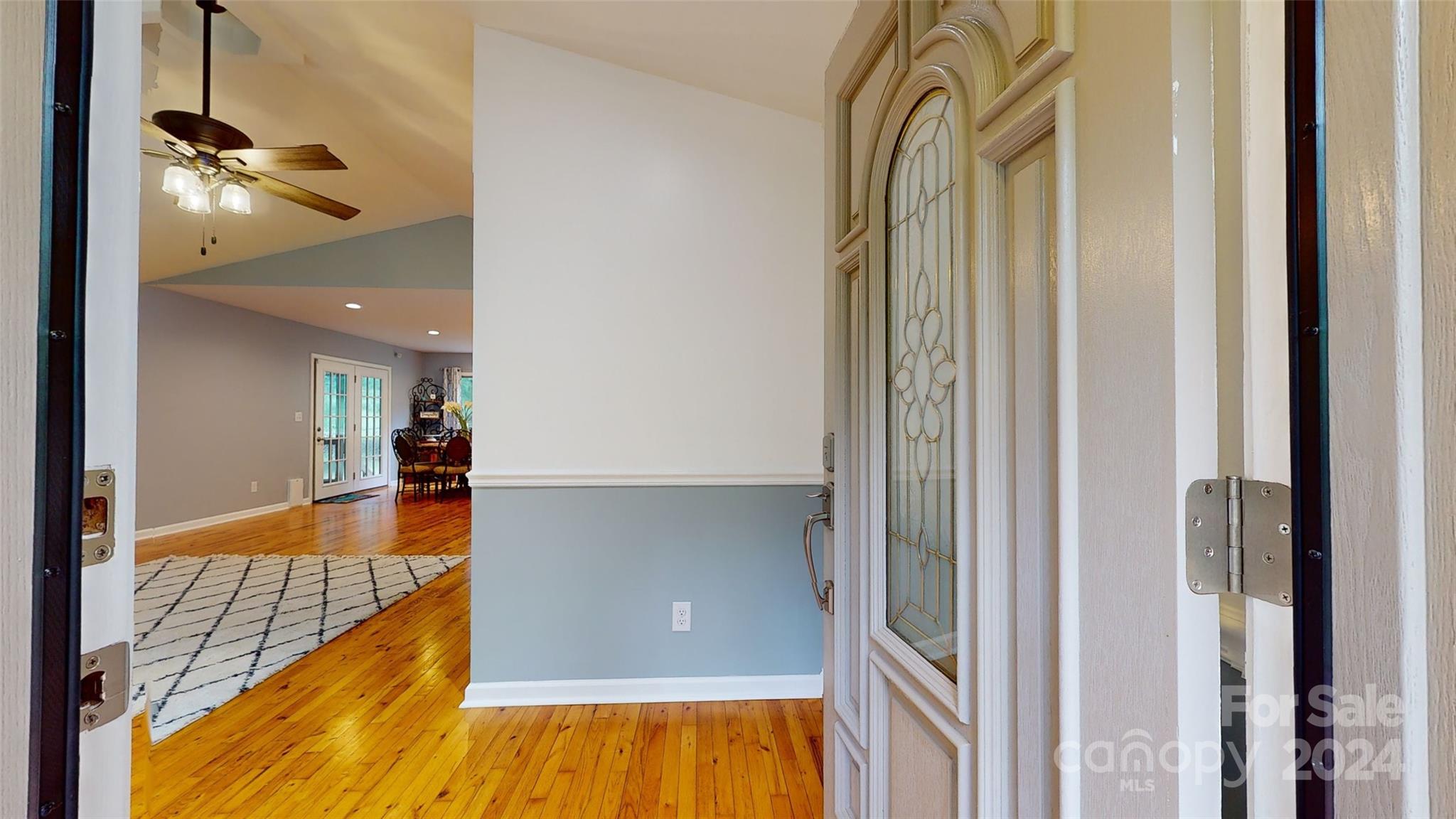 a view of a living room with a flat screen tv