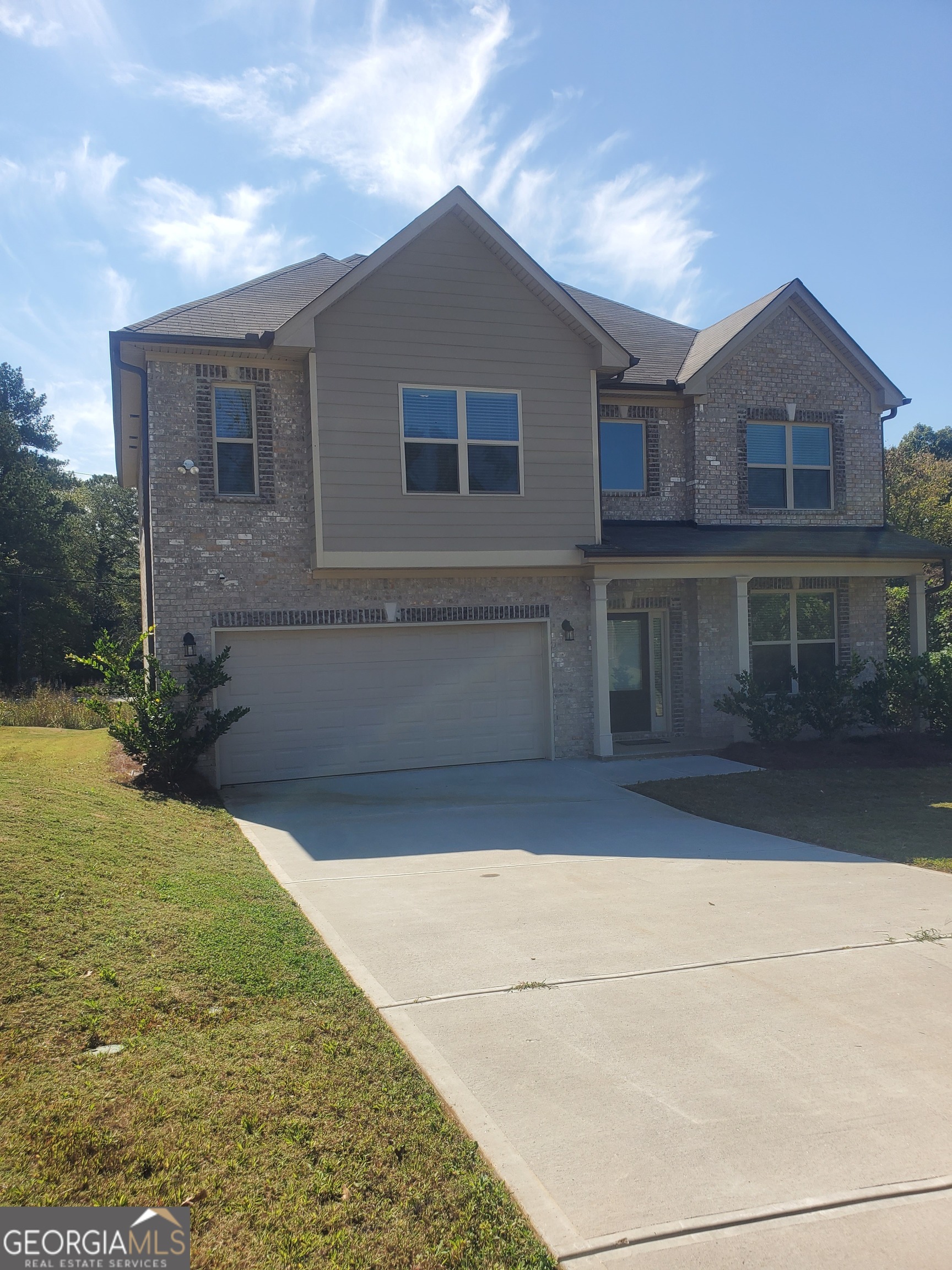 a view of house with outdoor space