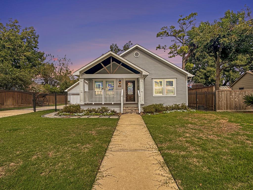 a front view of a house with yard