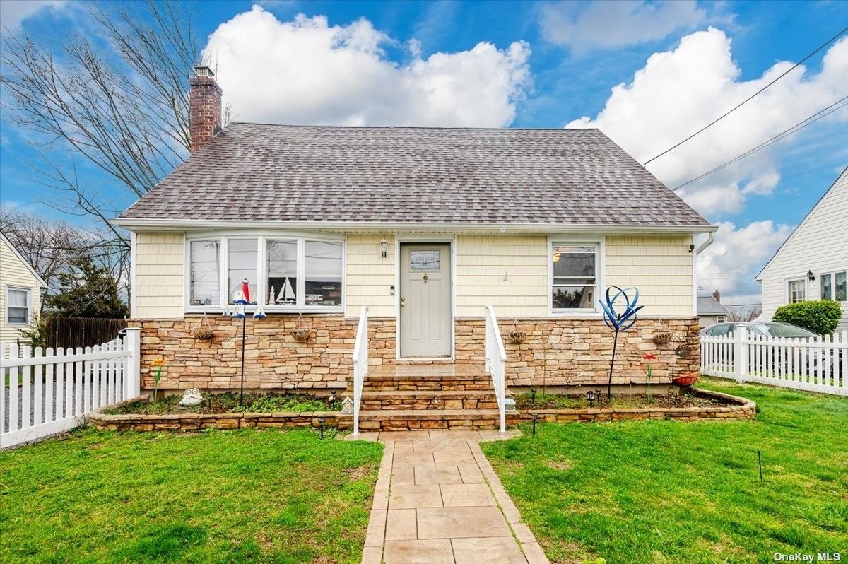 a front view of house with yard