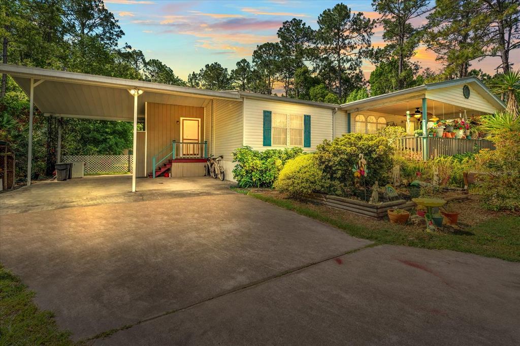 a house view with a backyard space