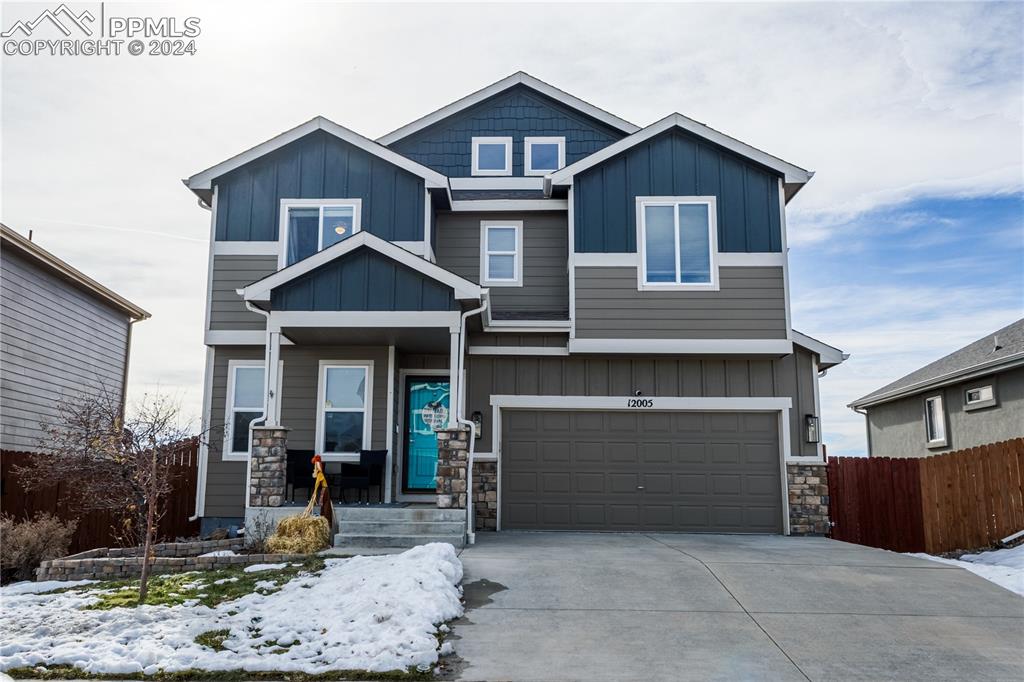 Craftsman-style house with a garage