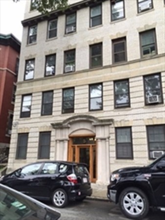 a car parked in front of a building