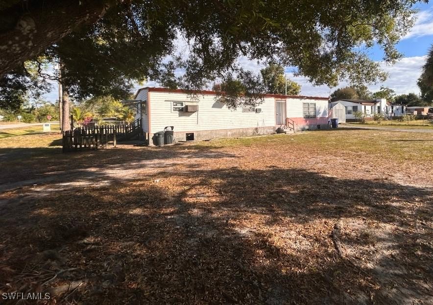 a view of open space with yard