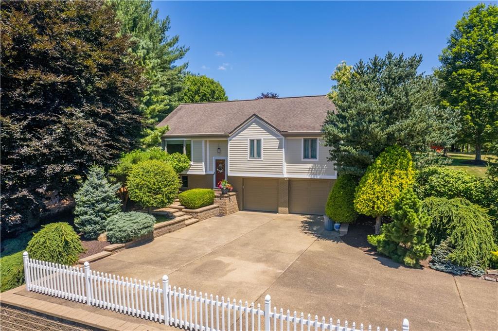 a house view with a garden space