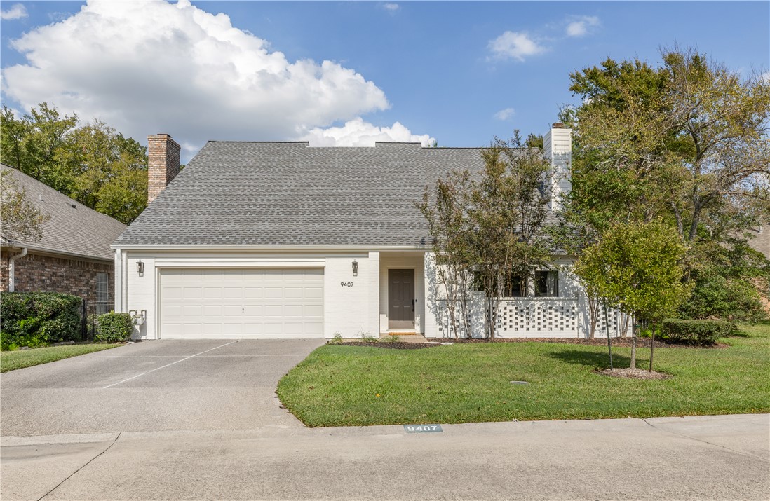 front view of house with a yard