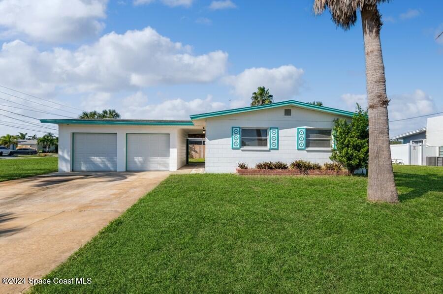 front view of a house with a yard