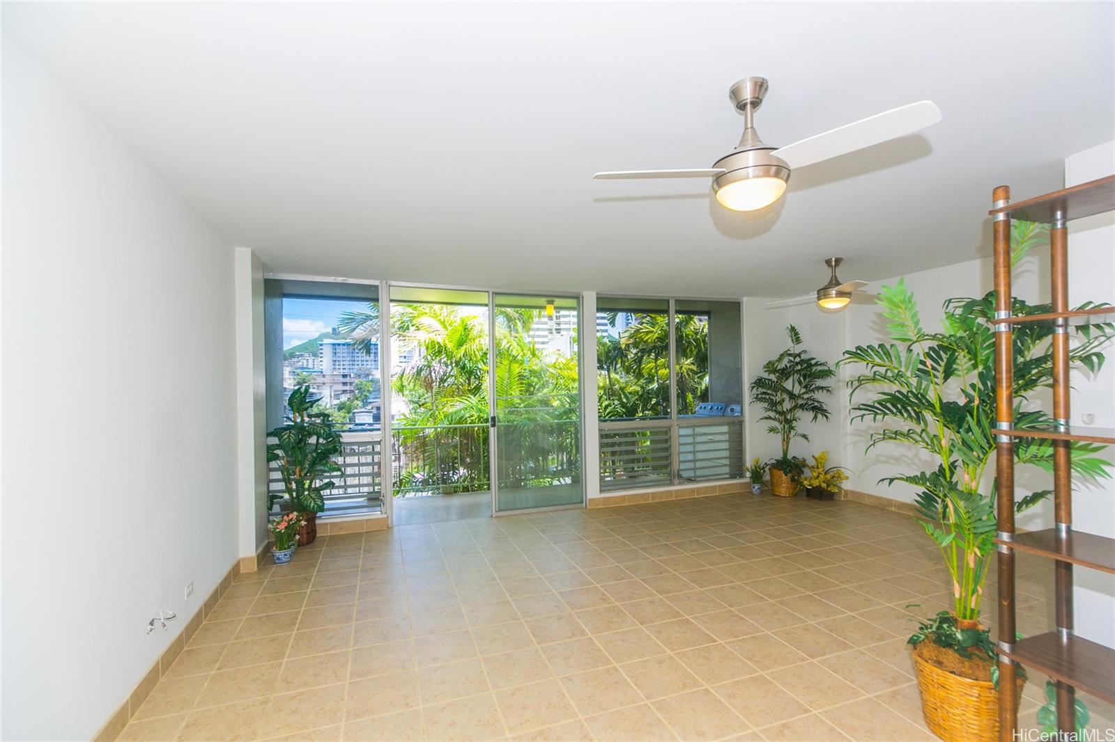 a view of livingroom with furniture and floor to ceiling window