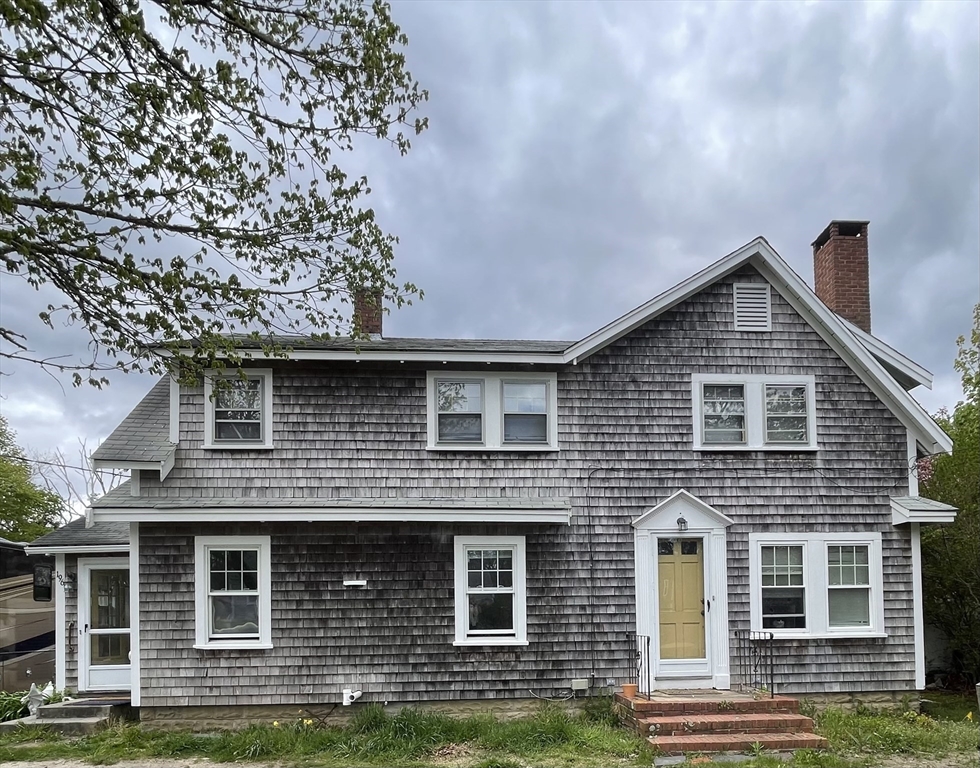 a front view of a house with windows