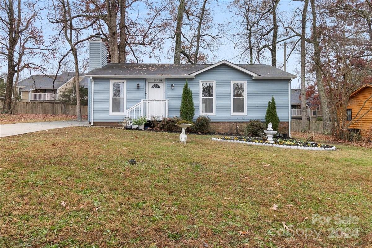 a front view of a house with yard