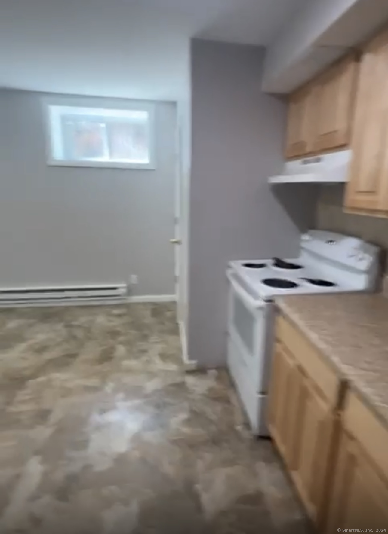 a storage room with washer and dryer