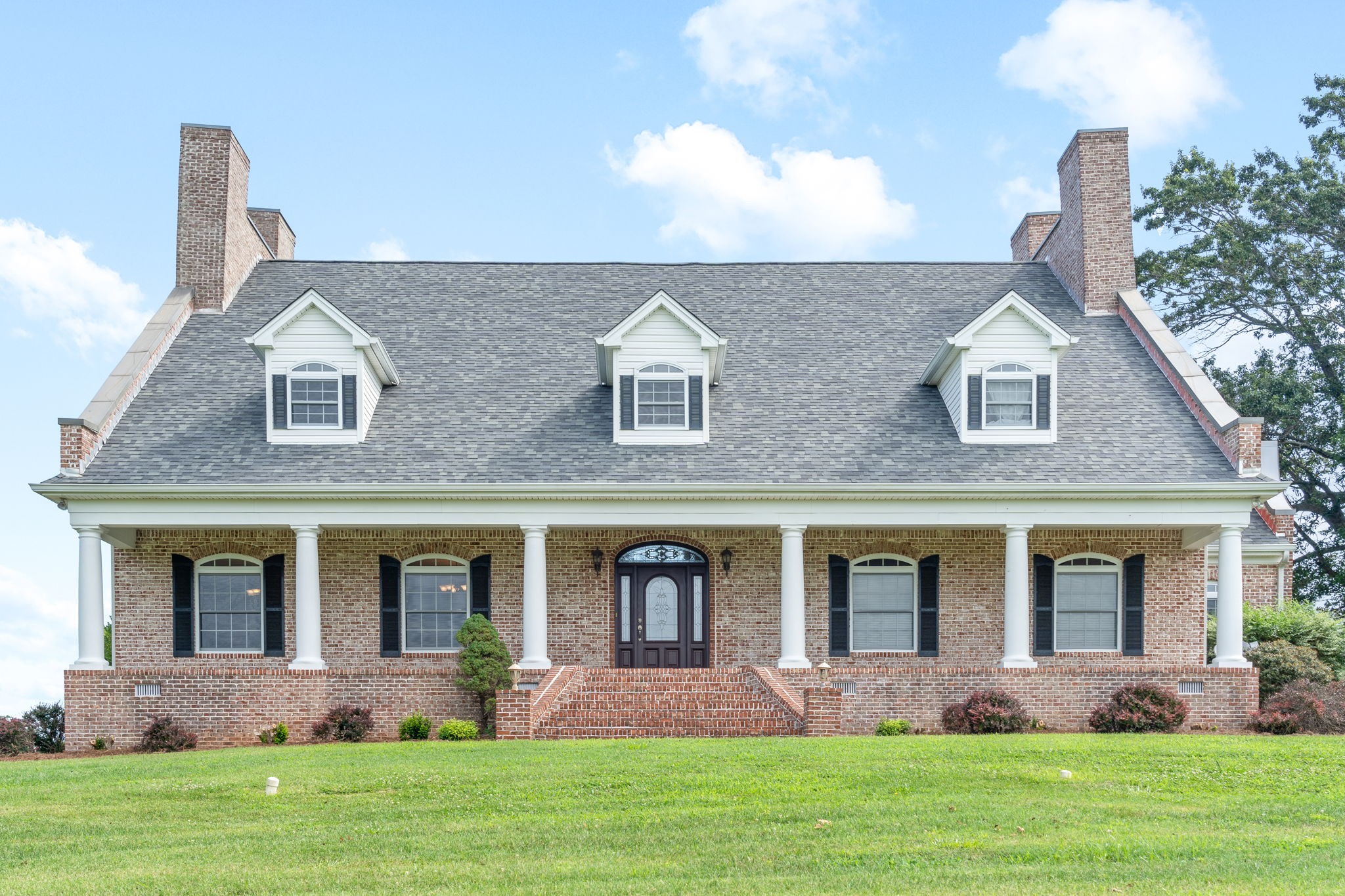 front view of house with a yard