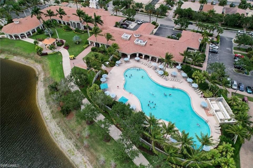 an aerial view of a swimming pool and outdoor space