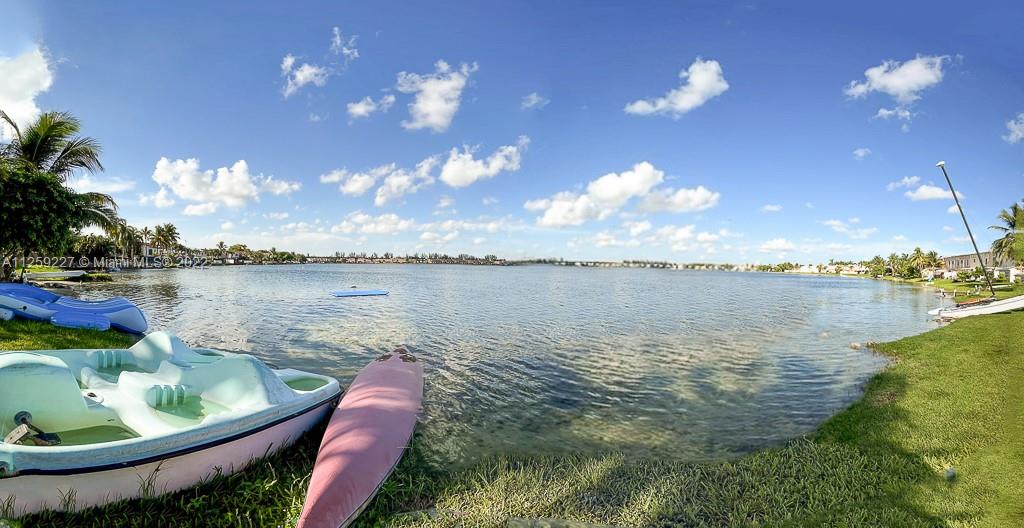 a view of a lake from a yard