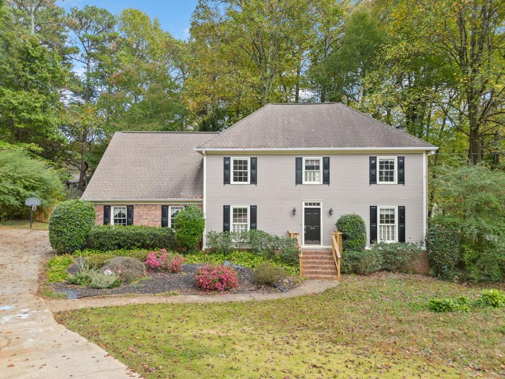 front view of a house with a yard