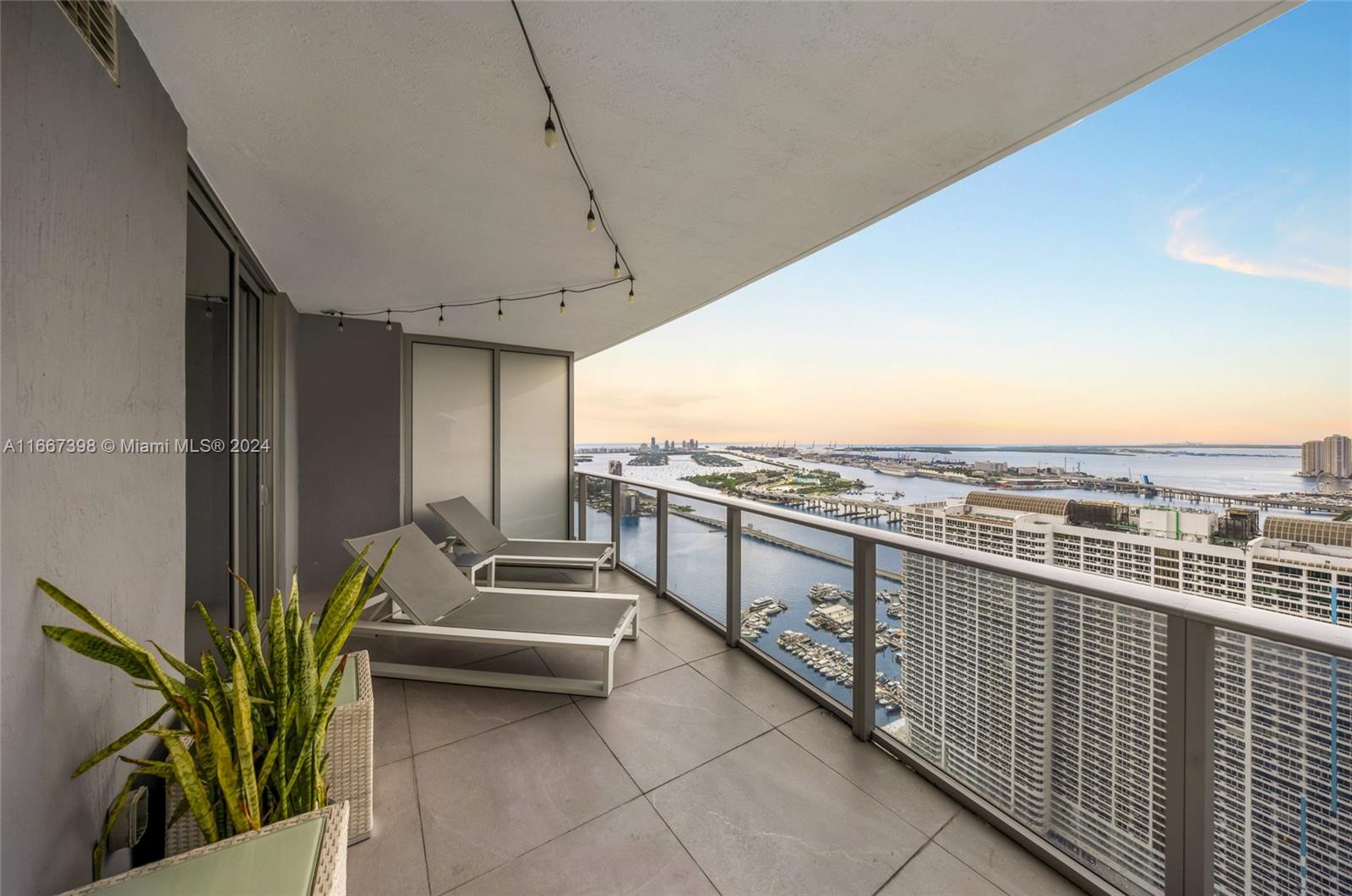 a view of a balcony with chairs