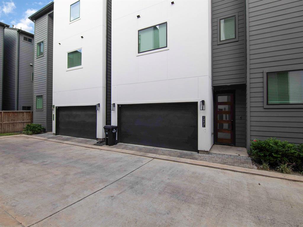 a front view of a house with a garage