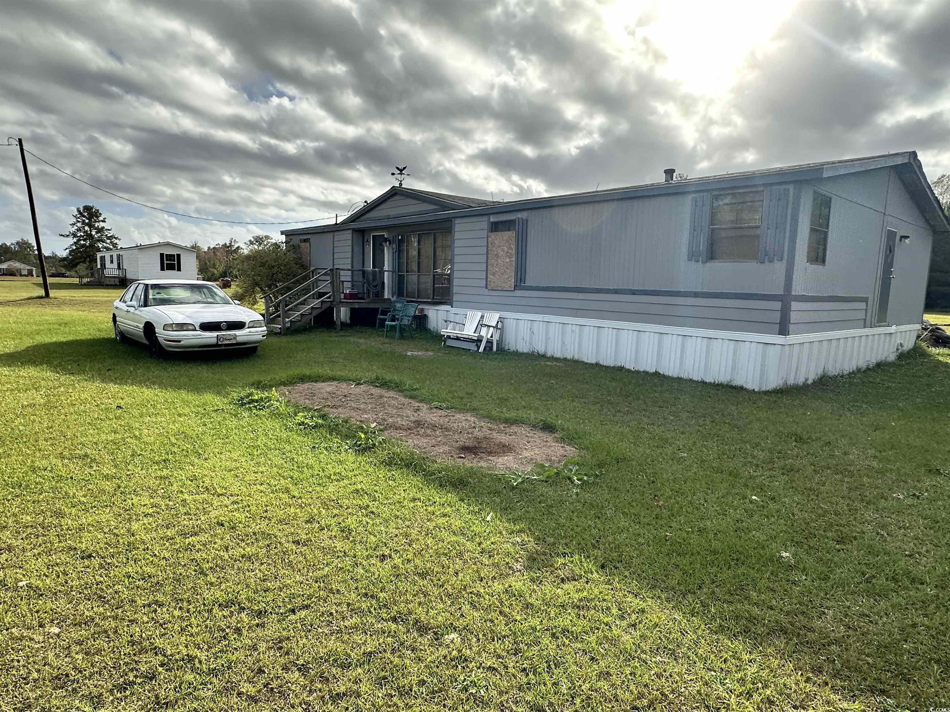 Exterior space with a yard