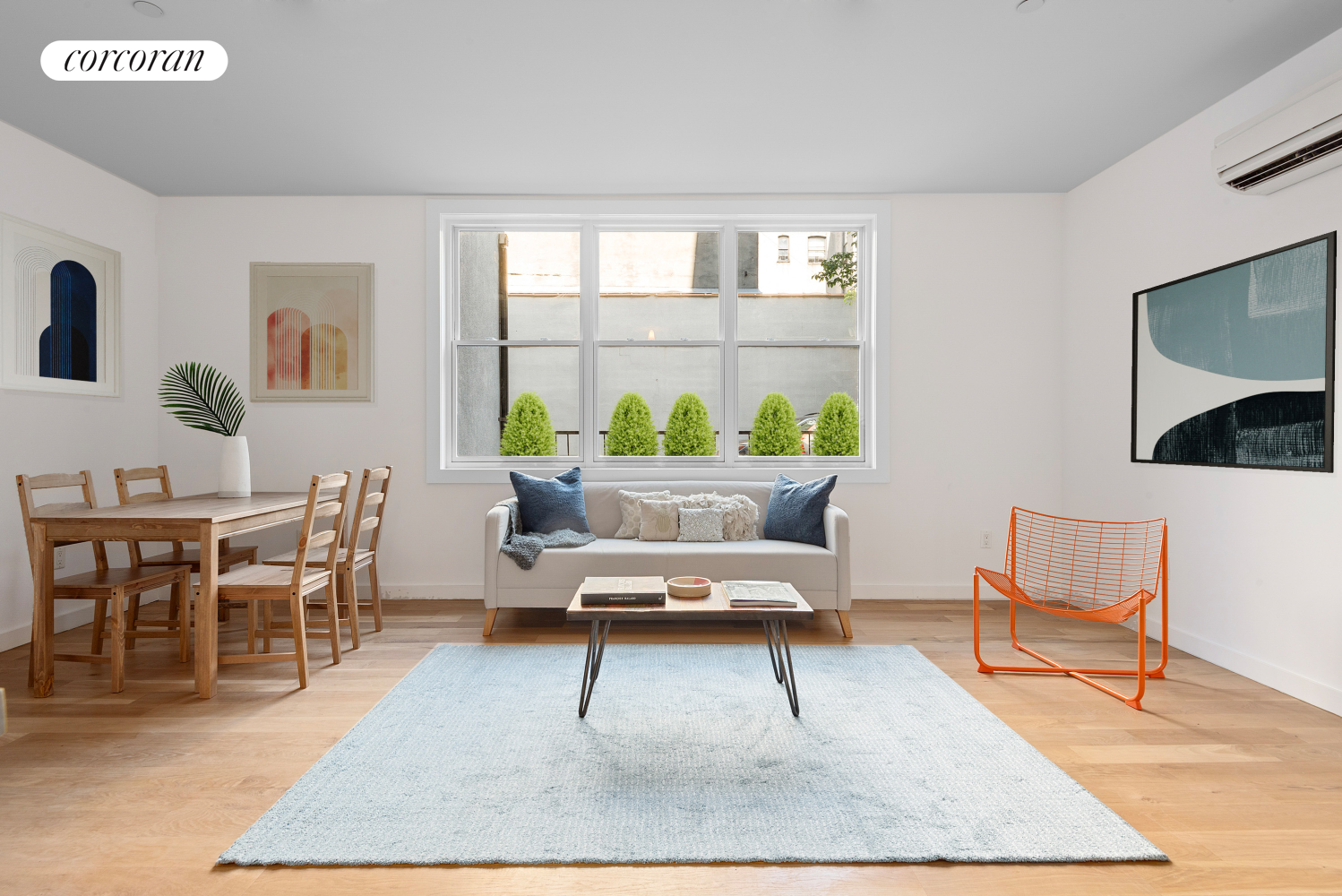 a living room with furniture and a rug