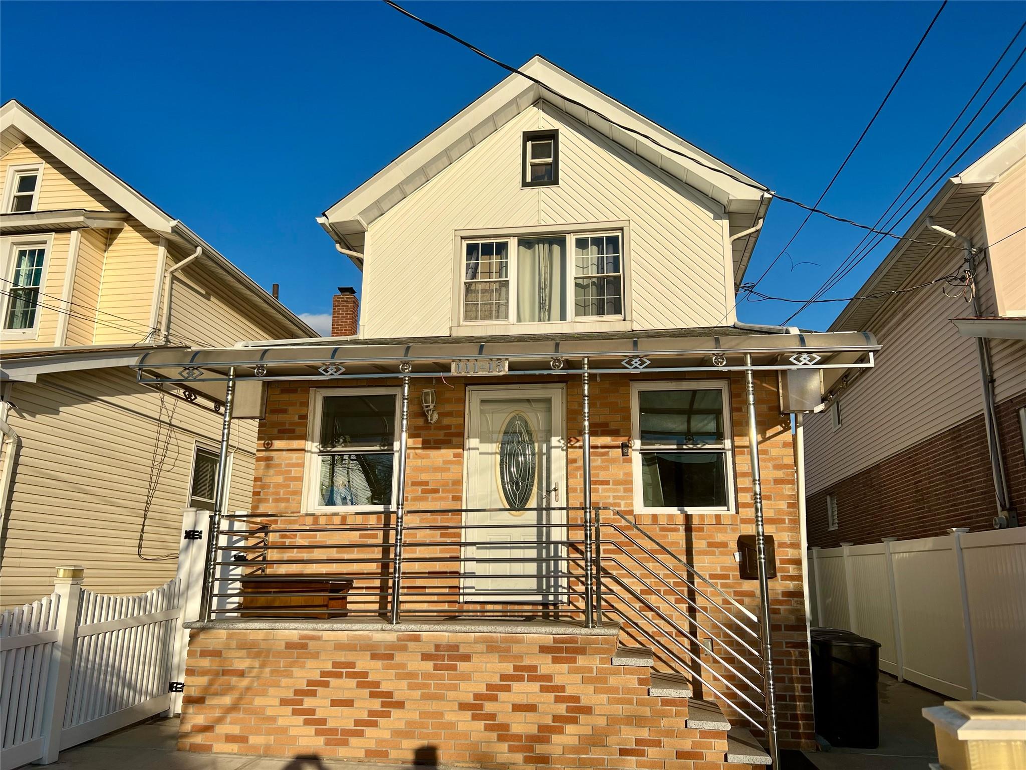 View of front of home with covered porch