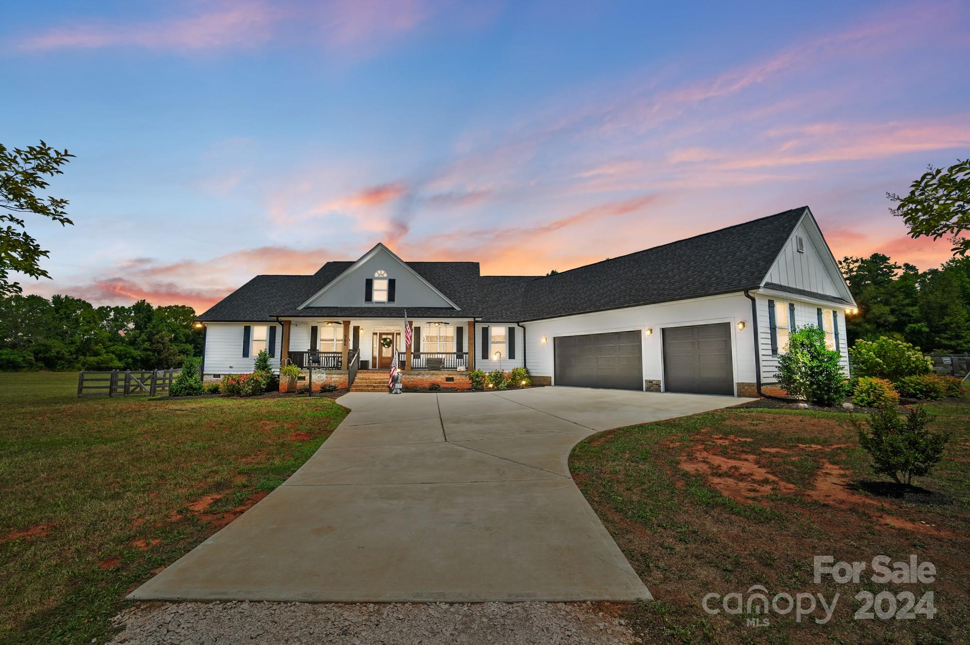 a front view of a house with yard